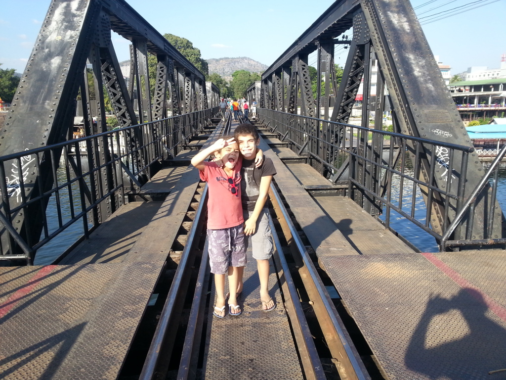 Leaning history and geography by foot. In Kanchanaburi Thailand over the Kwai river