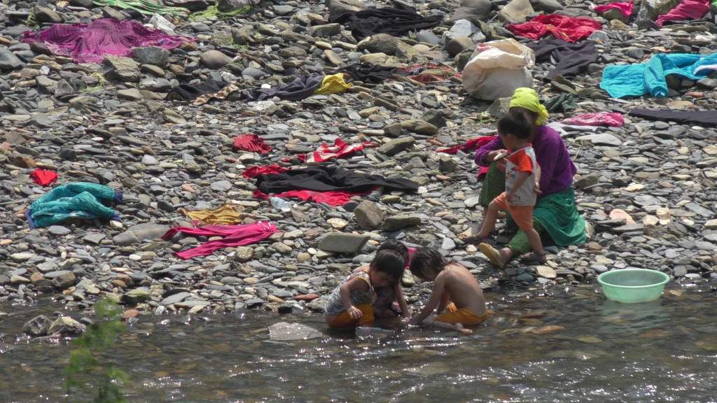 Doing laundry by the river